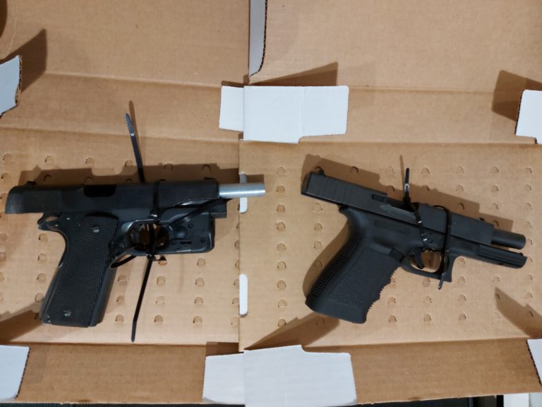 Handguns, drugs taken in multiple-person arrest