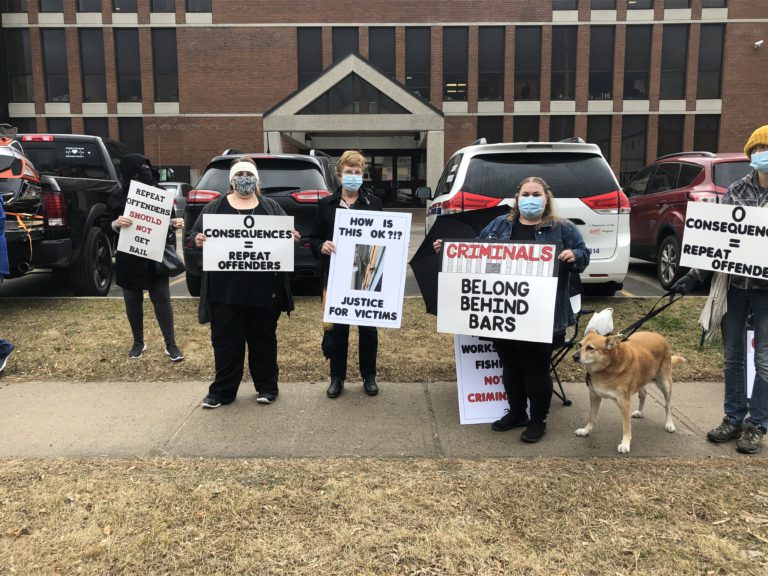 Demonstrators protest crime in the area