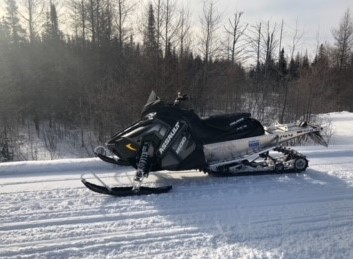 Police search for suspected snowmobile thieves