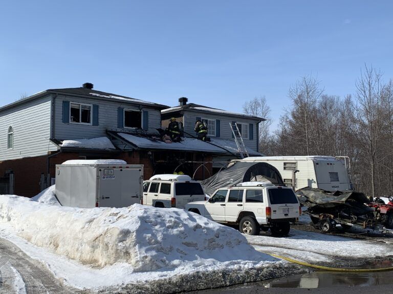 ‘Flames above the roof of the home’, Deputy Fire Chief Greg Saunders