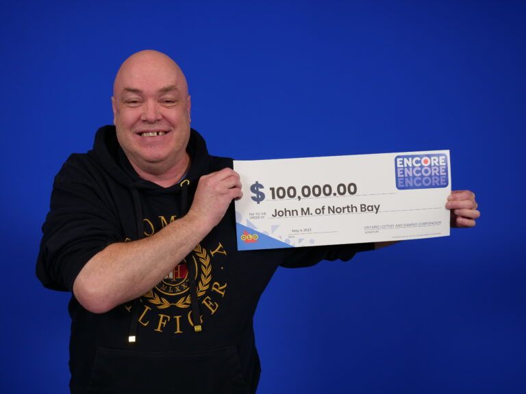 City man celebrating lotto win