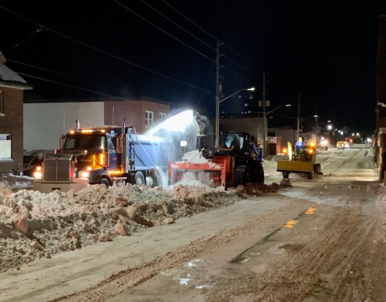City continues removing snowbanks from area streets