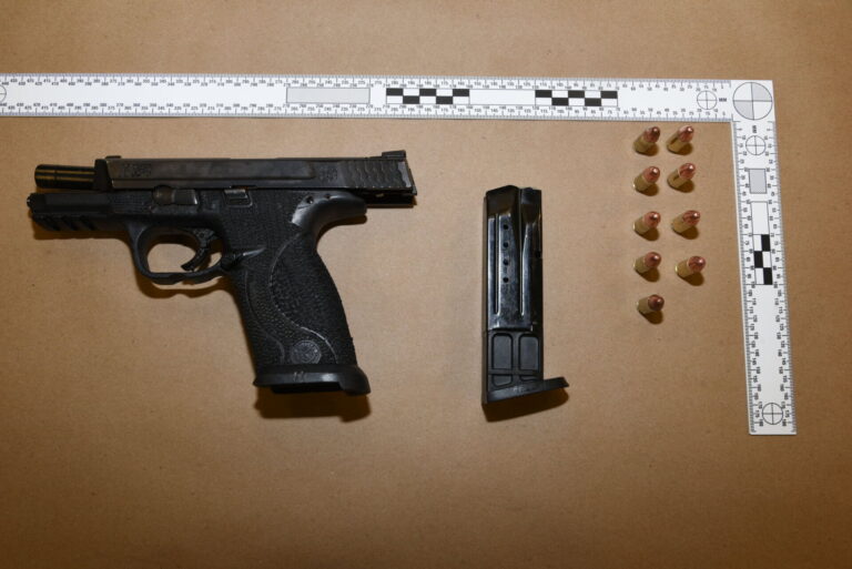 Three charged after police seize loaded handgun and suspected drugs