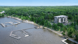 Shovels hitting the ground on The Breeze Beachfront Condos on Callander Bay